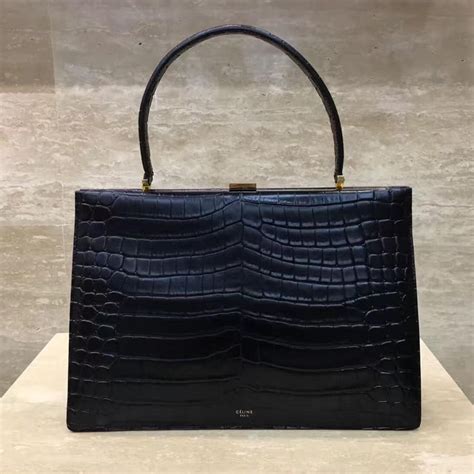 Medium Clasp handbag in crocodile 